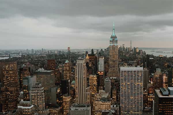 dark clouds over a major metropolitan skyline