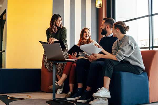 coworkers collaborate in an inclusive oficec environment