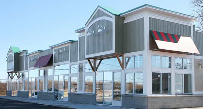 an empty vacant retail shopping strip center