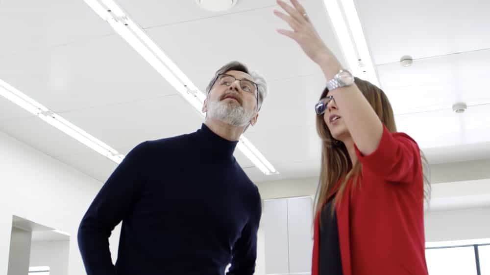 Two capital markets brokers discussing a deal