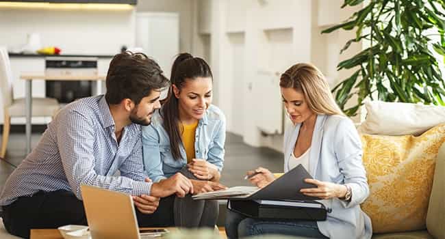 a healthcare real estate advisor discusses a lease agreement with two practice owners