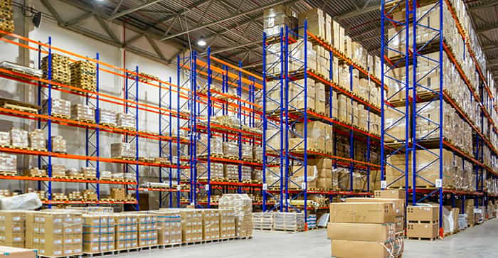 Internal shot of a big box warehouse with pallets of items