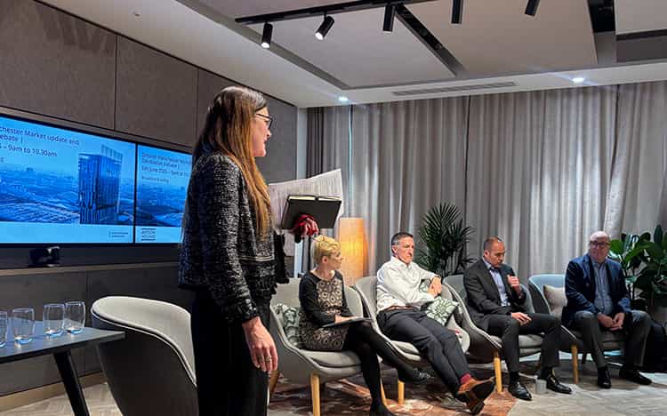 An image of panel members speaking at the Manchester devolution event