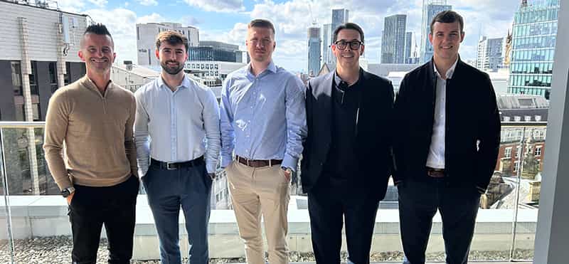 An image of new hires in the Manchester office