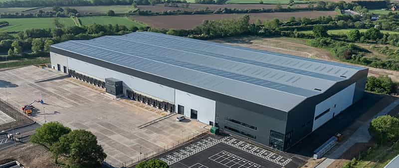 An aerial image of a large warehouse in the UK