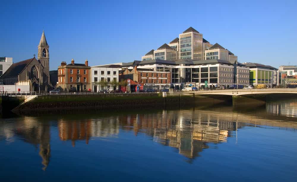 An image of a group of commercial properties in front of a waterfront