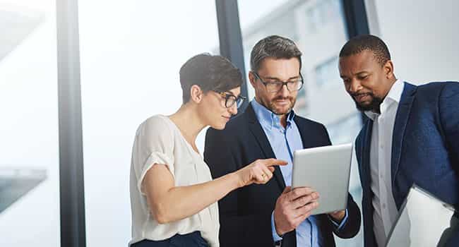 real estate advisors discuss Vancouver commercial property valuation with client