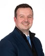 Professional Profile Photo for Alex Thompson, Associate Director